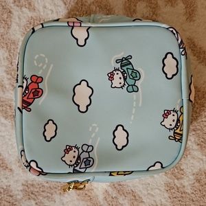 Stoney clover lane small pouch Hello Kitty airplanes and clouds print.